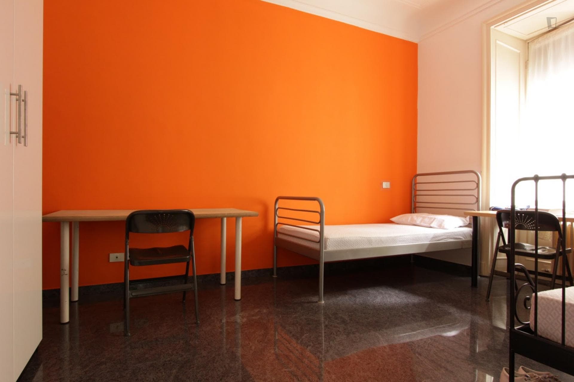Bed in a twin bedroom, close to IED photo 1