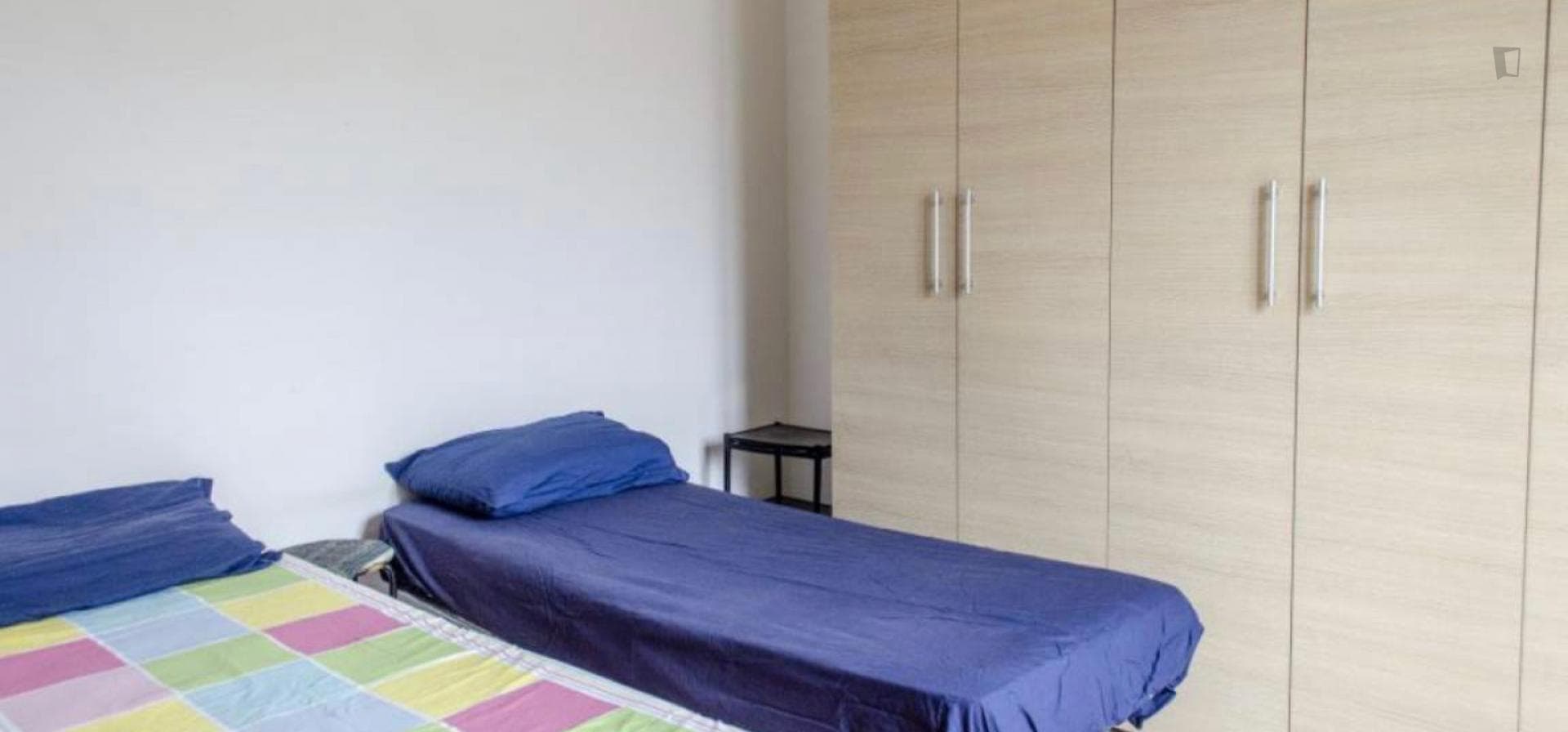 Bed in a cosy twin bedroom, in Gianicolense photo 1