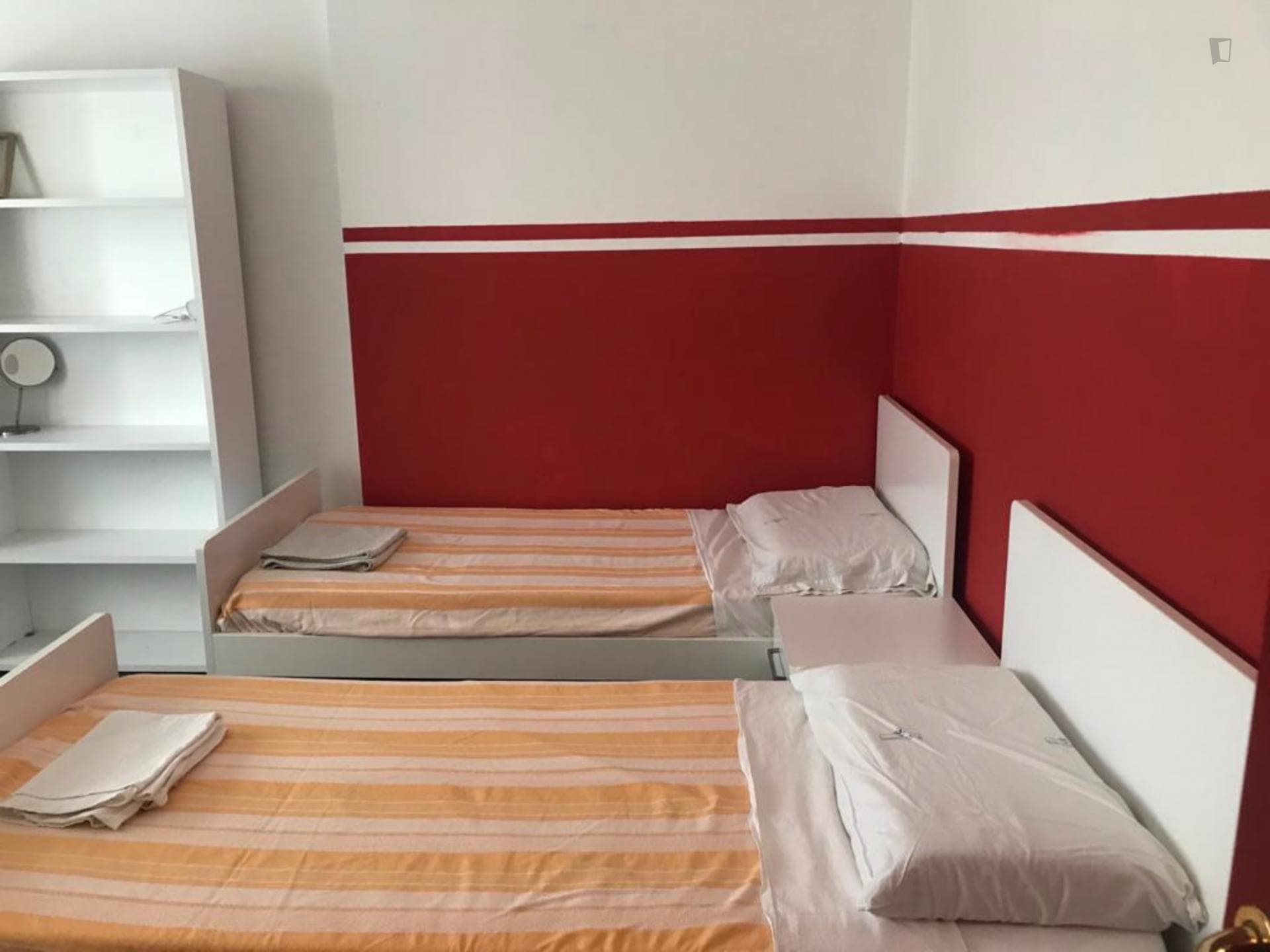 Bed in a twin bedroom close to NABA photo 1