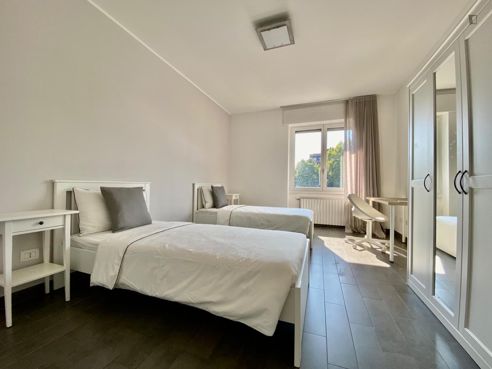 Nice bedroom with two single beds photo 1