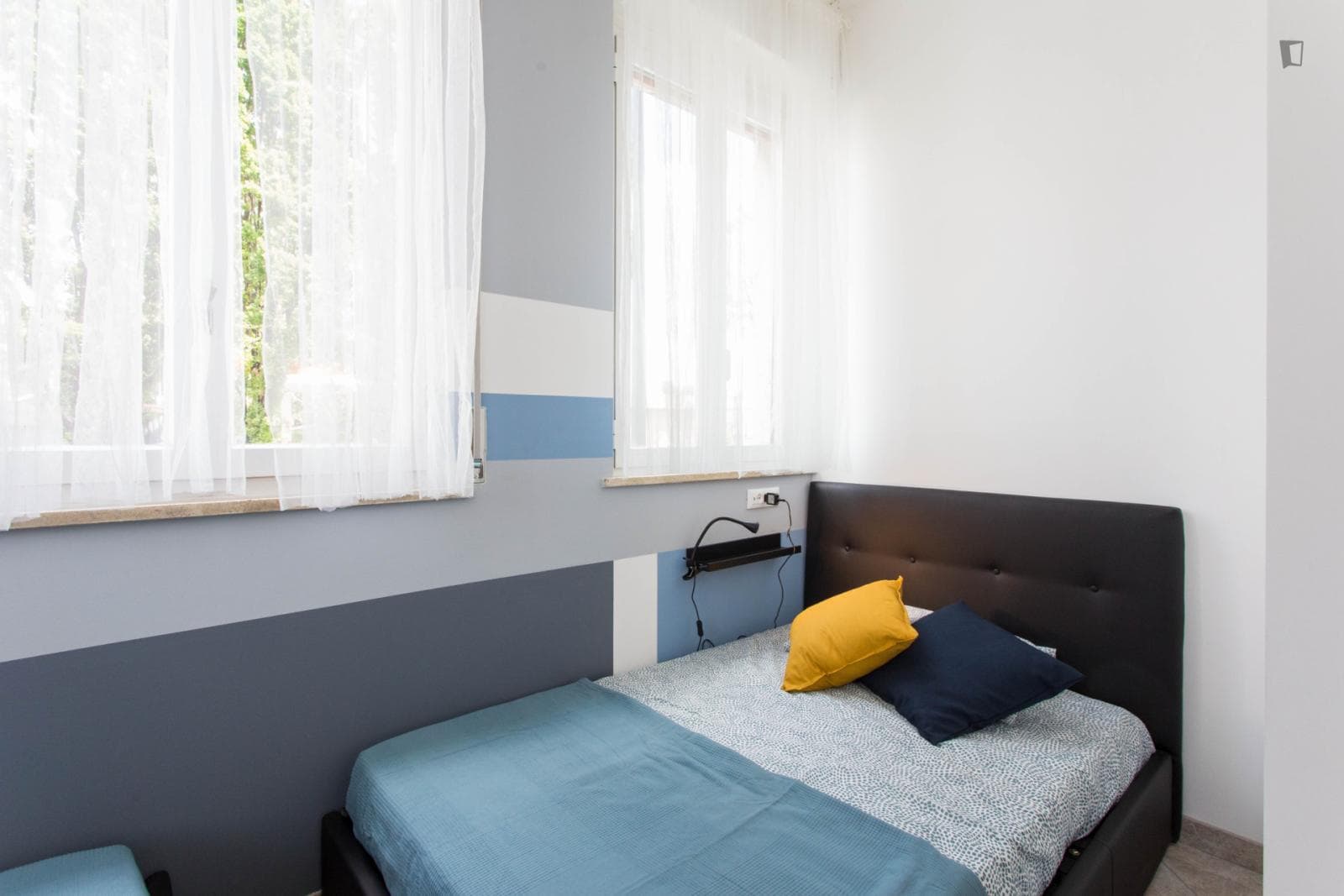 Bed in a twin bedroom next to Politecnico Bovisa Campus photo 1