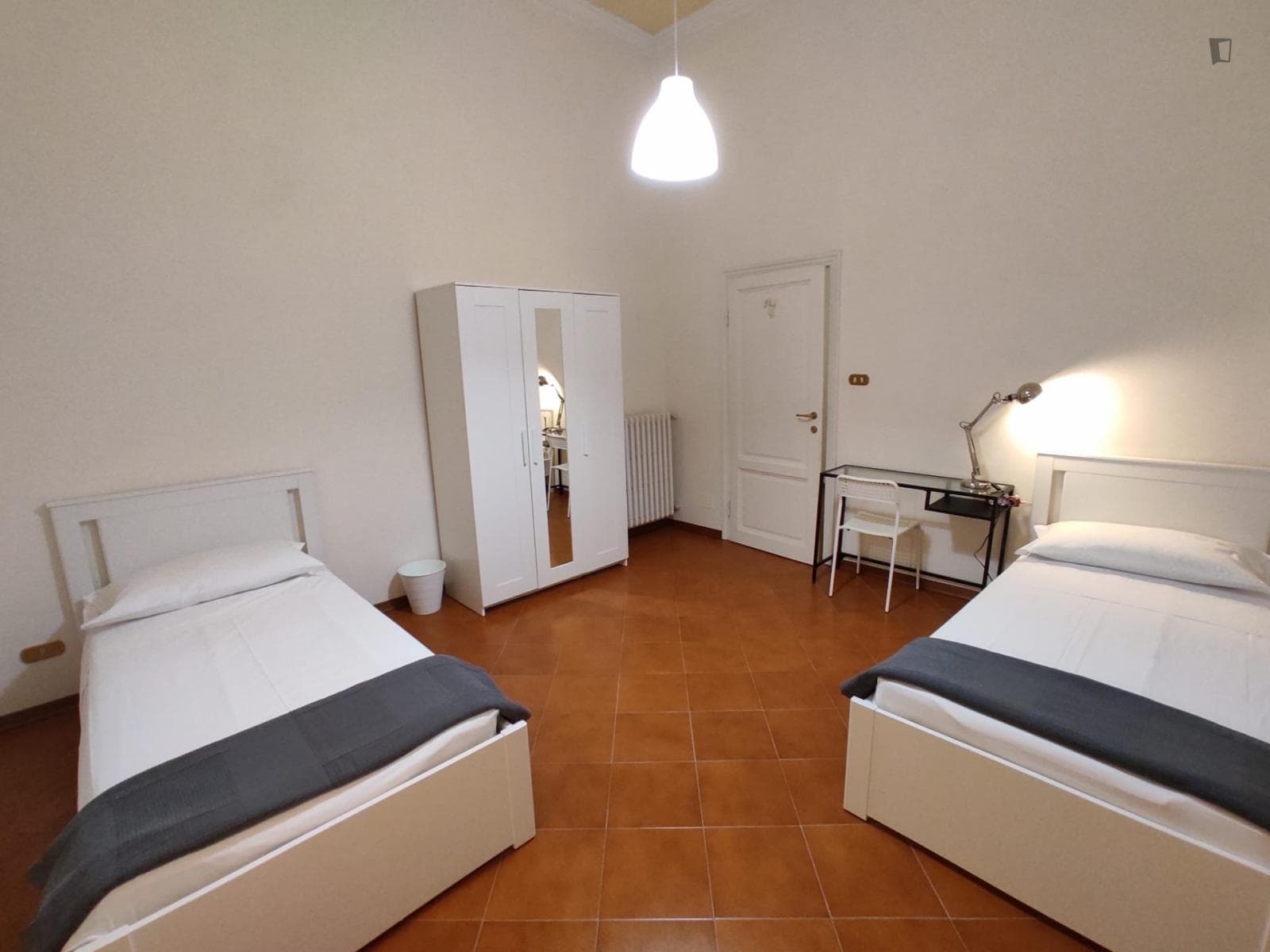 Bed in a comfy twin bedroom, in Acquabella photo 1