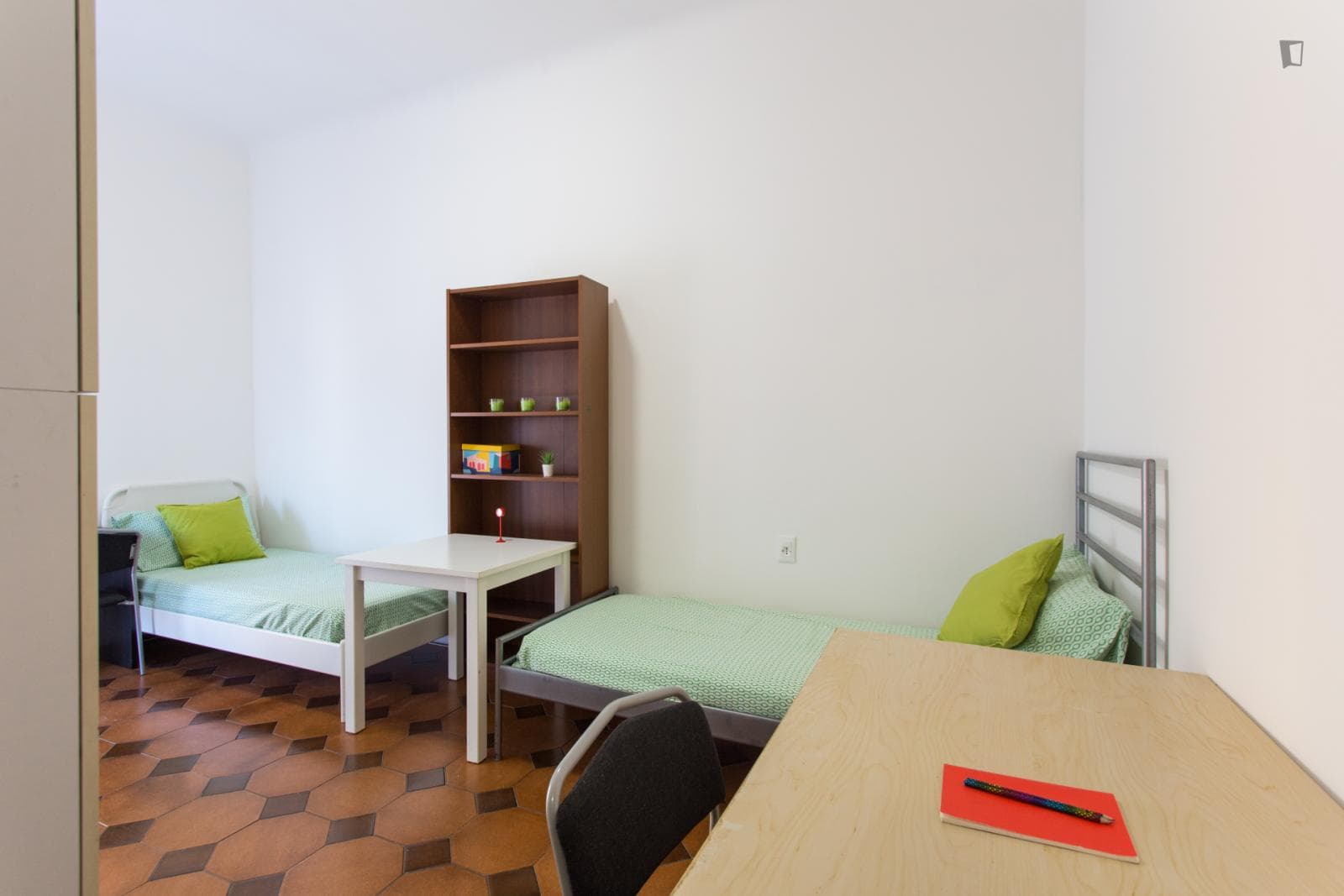 Bed in a twin bedroom in a two-bedroom flat in Città Studi area photo 1