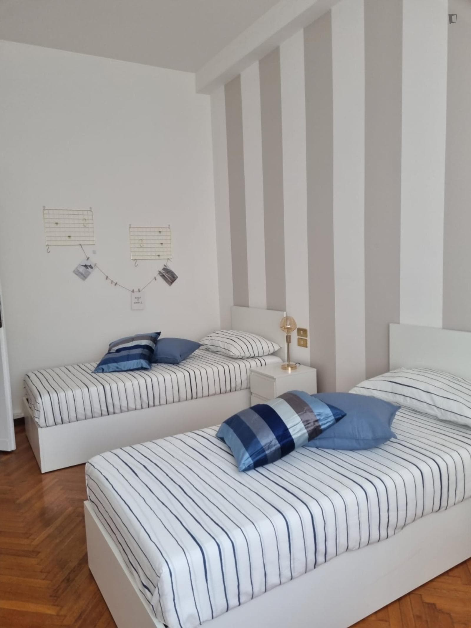 Bed in a welcoming twin bedroom near Università Statale photo 1