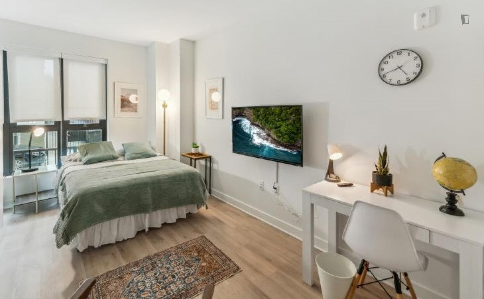 Inviting bedroom next to Commercial-Broadway Station photo 1