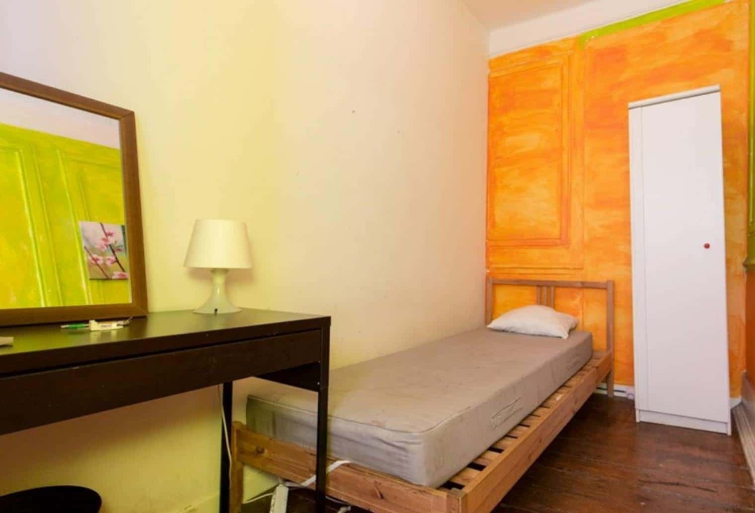 Quarto com cama de solteiro em apartamento com 8 quartos - FLAT 5D - SALDANHA 55D photo 1