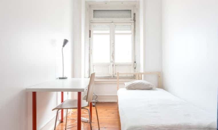 Quarto com cama de solteiro em apartamento com 7 quartos - FLAT M - M5 photo 1