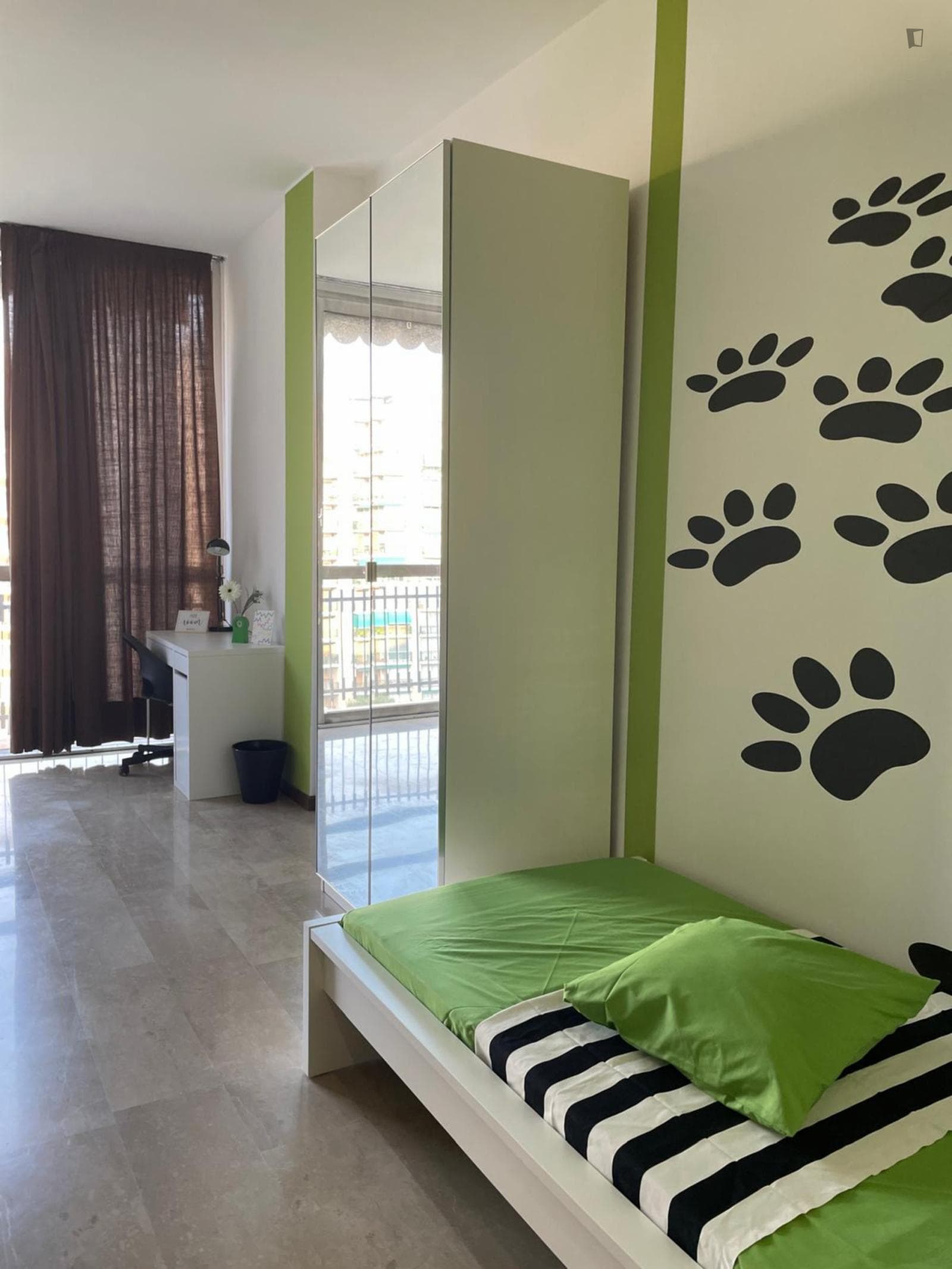 Bed in a bright twin bedroom with a balcony, in Isola del Bosco - Delle Corti photo 1