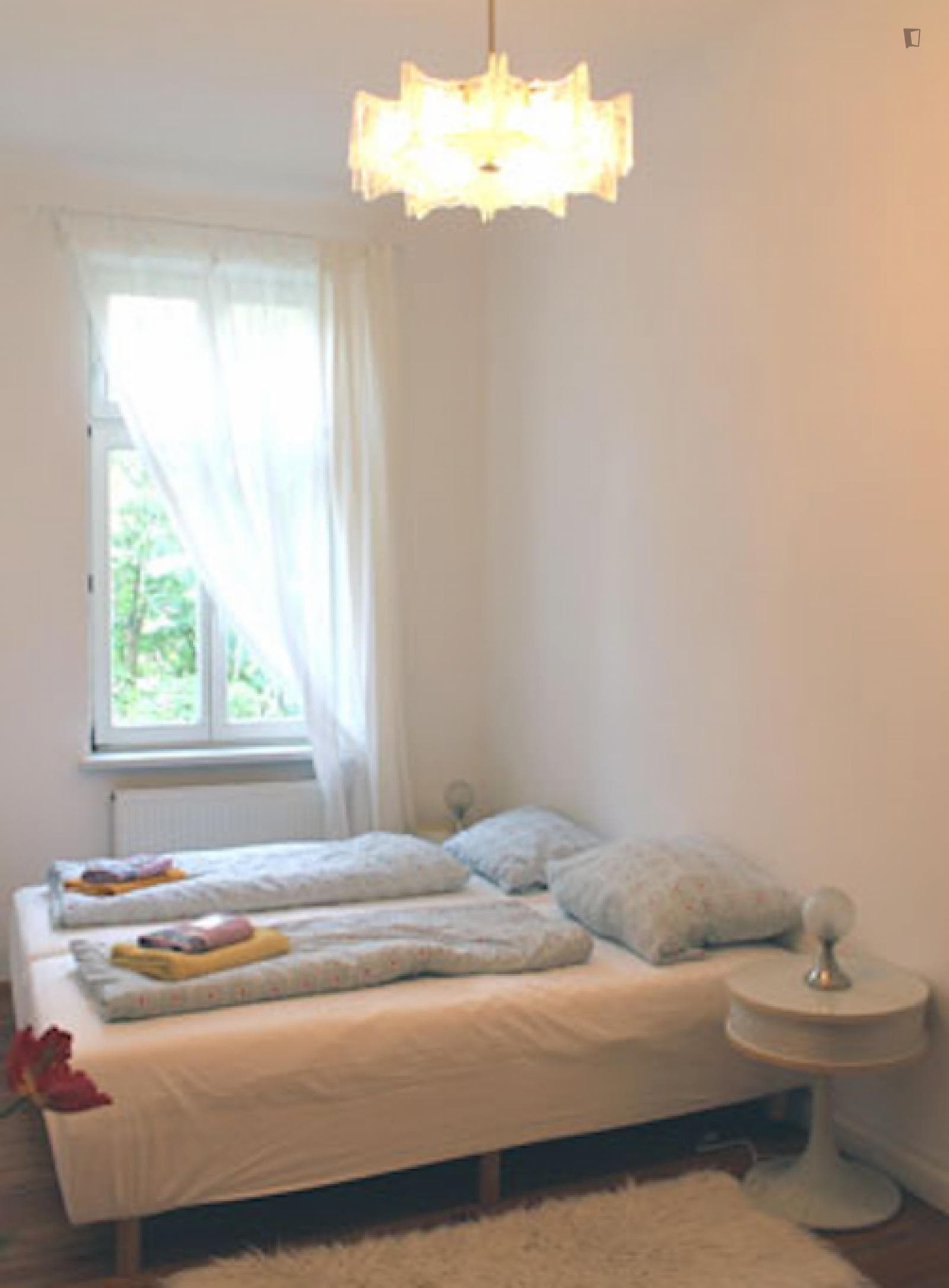 Bed in 2 bedroom apartment photo 1