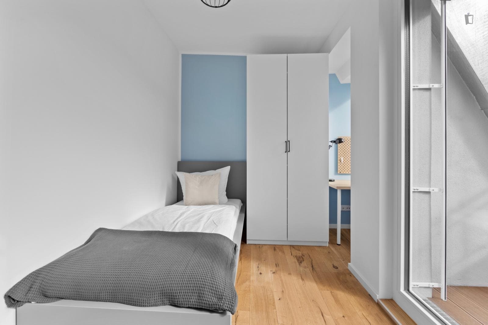 Welcoming single bedroom with a balcony, in Wedding photo 1