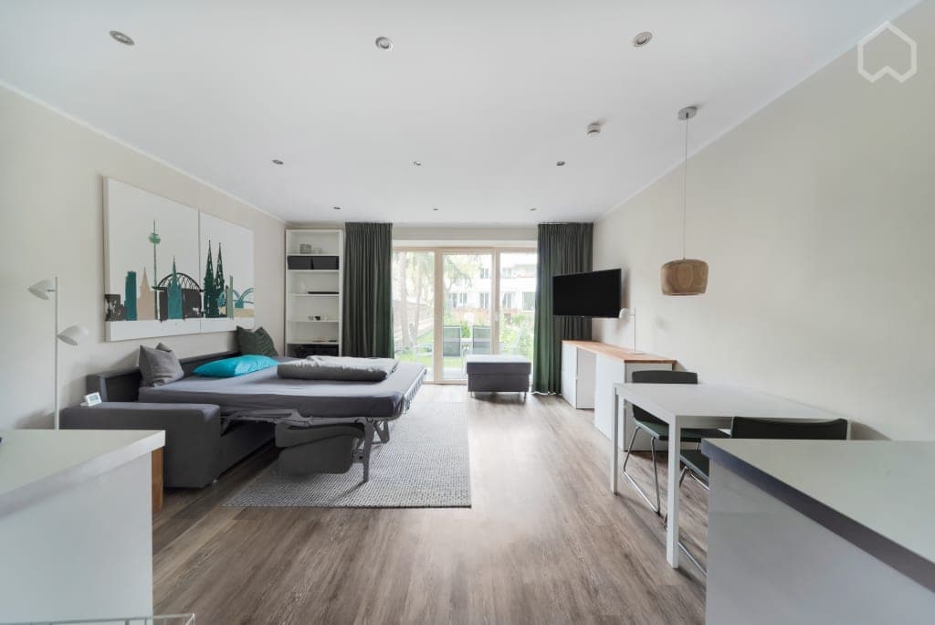 Stylish apartment in dream location with terrace, pool and garden photo 1